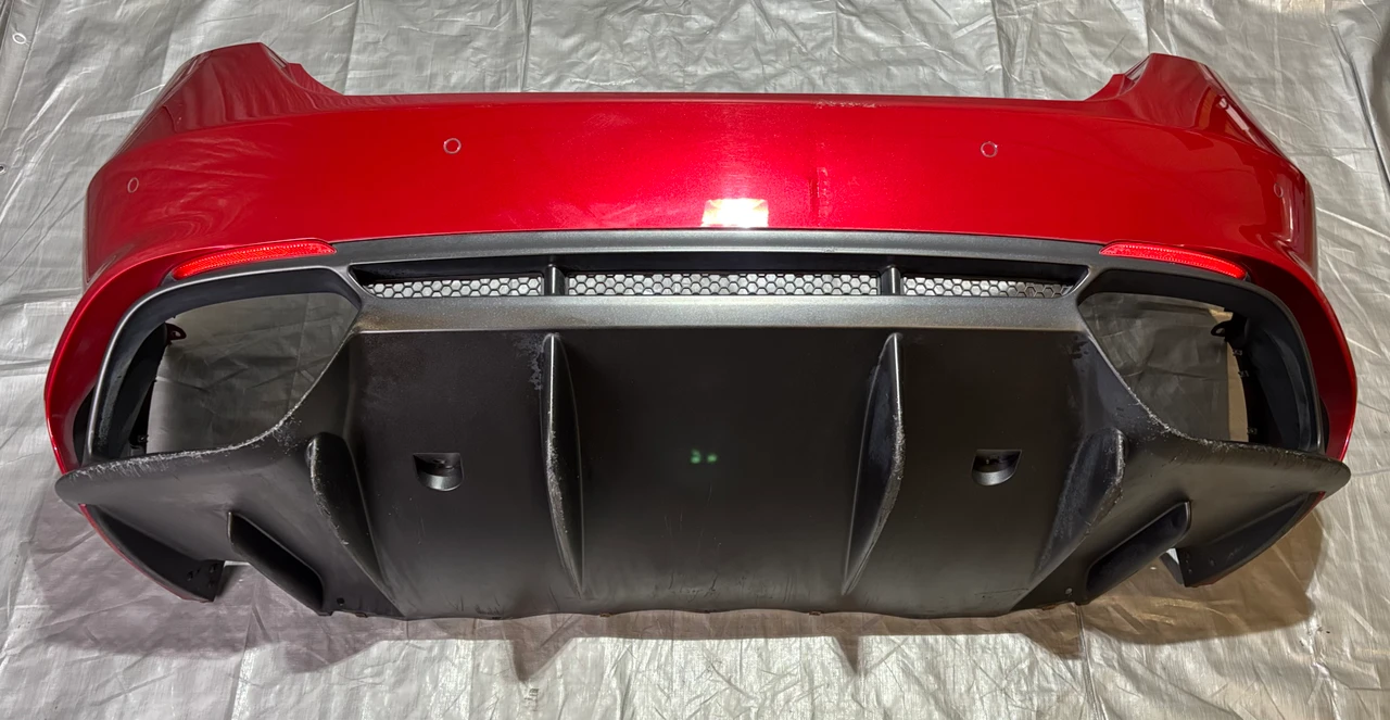 2017-2021 Alfa Romeo Giulia Quadrifoglio OEM Rear Bumper Cover w/ Diffuser / Rosso Competizione AG007